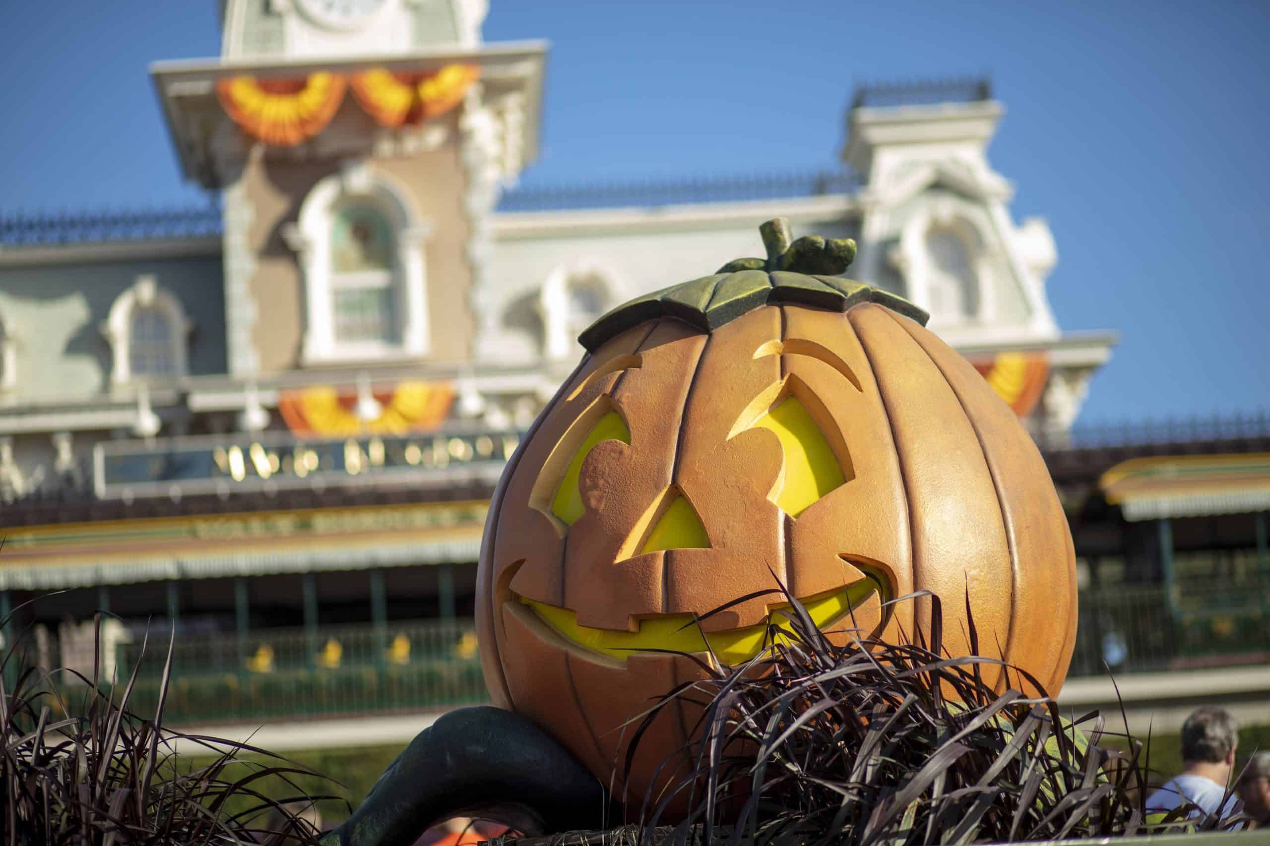 Halloween pumpkin in front of Magic Kingdom during the season
