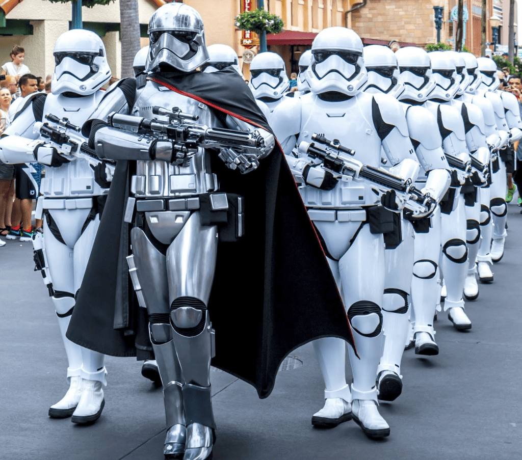 Two rows of Star Wars Storm Troopers marching down the street at Hollywood Studios.