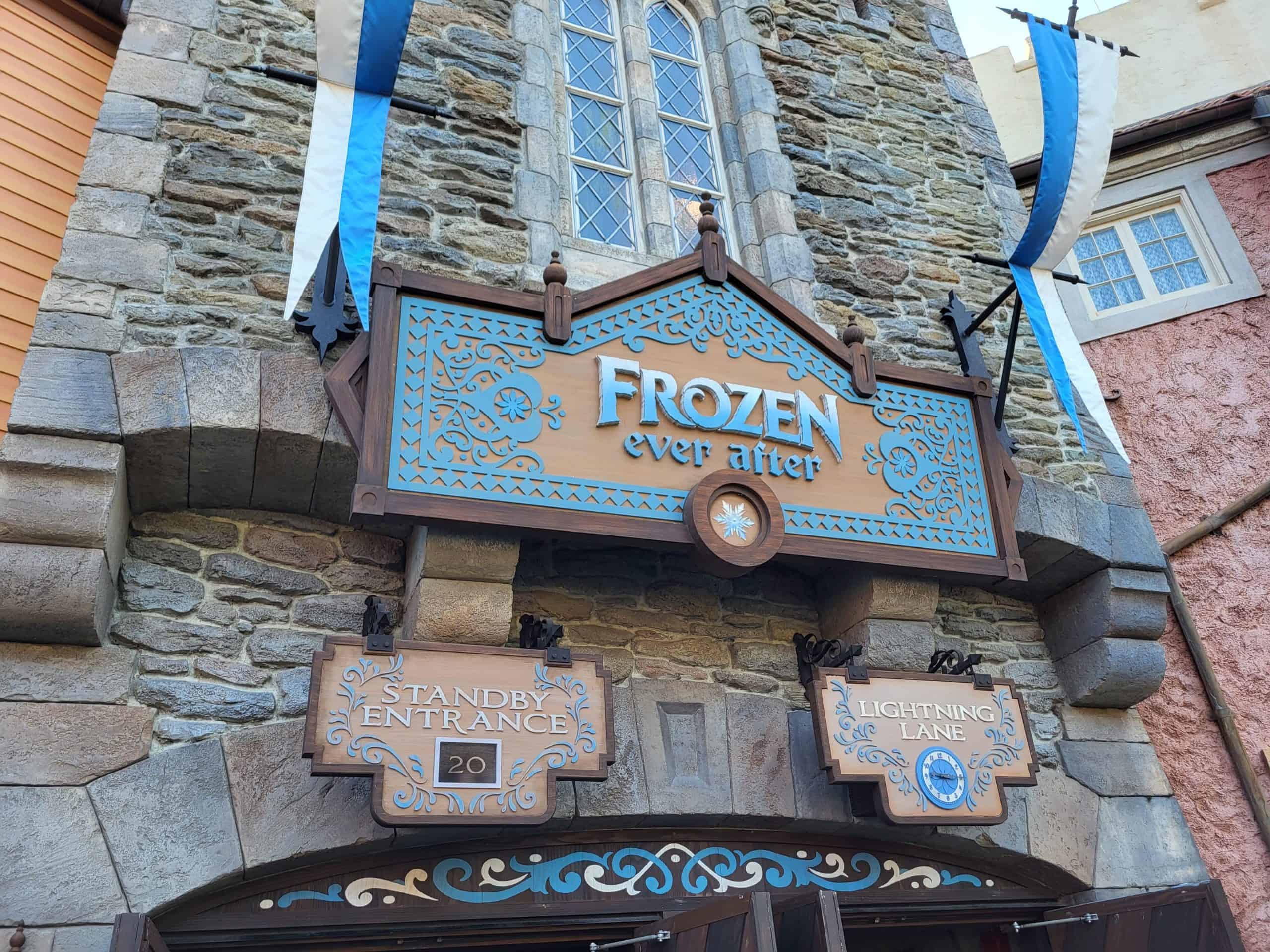 Frozen Ever After entrance sign, showing the standby wait and Lightning Lane sign