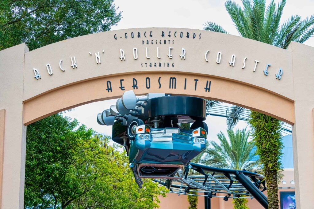 Entrance sign with upside down blue limo for Rock n Roller Coaster featuring Aerosmith at Hollywood Studios