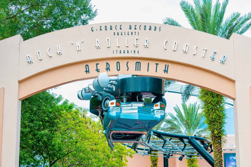 Upside down blue limo at Rock n Roller Coaster entrance sign