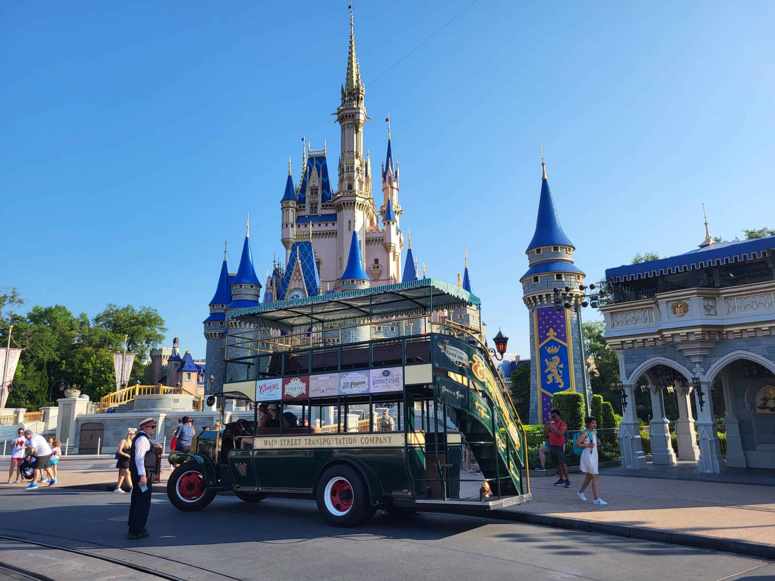 Cinderella Castle and double decker bus in the morning Magic Kingdom