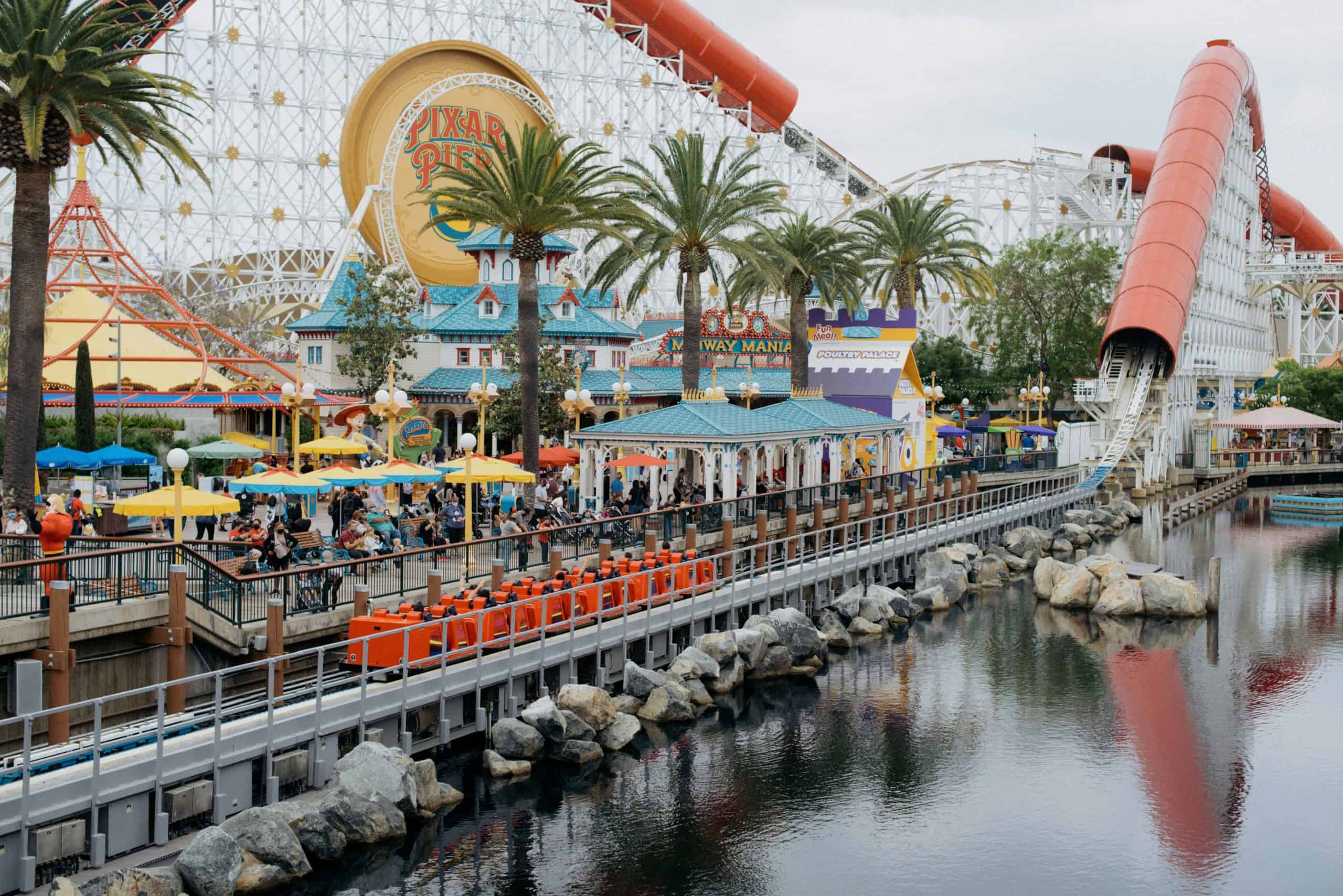 Incredicoaster waiting to launch on Pixar Pier with coaster in background