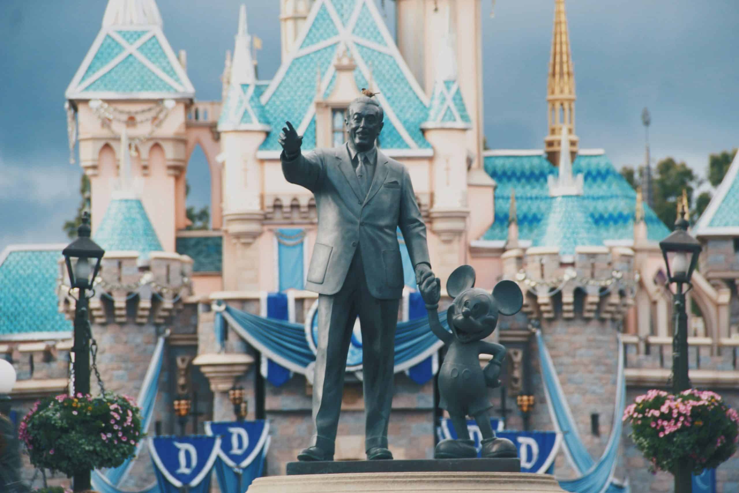 Partners statue of Walt Disney and Mickey Mouse with Disneyland Castle in background
