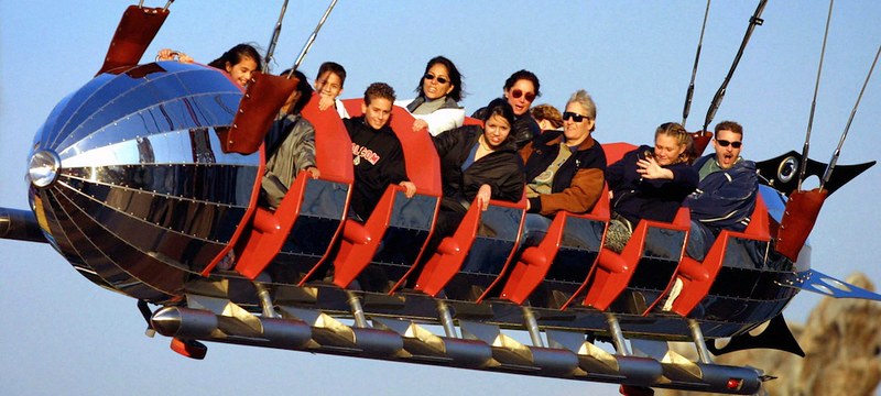 People riding Golden Zephyr at California Adventure
