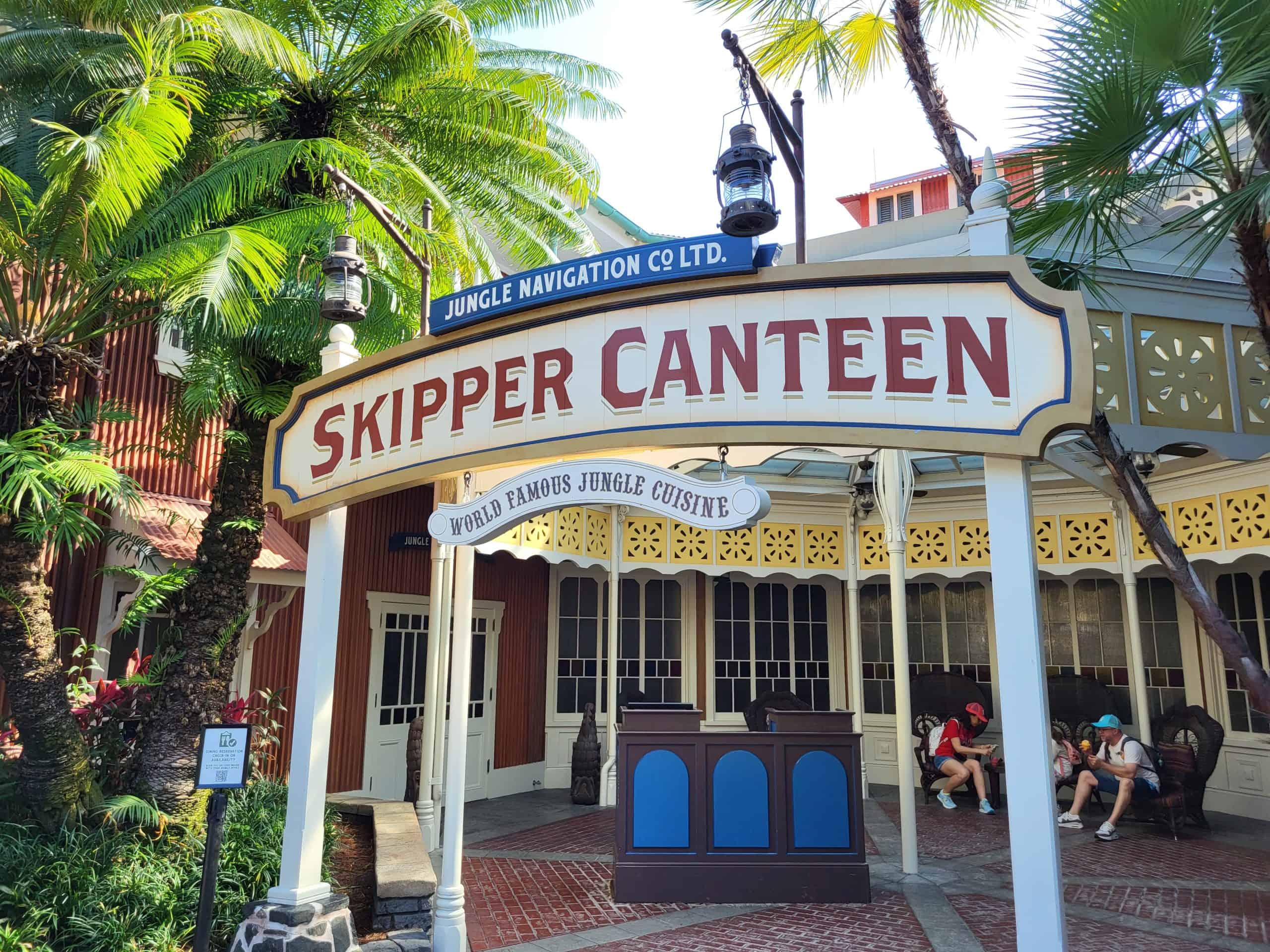 Outside entrance with palm tree of Skipper Canteen restaurant at Magic Kingdom