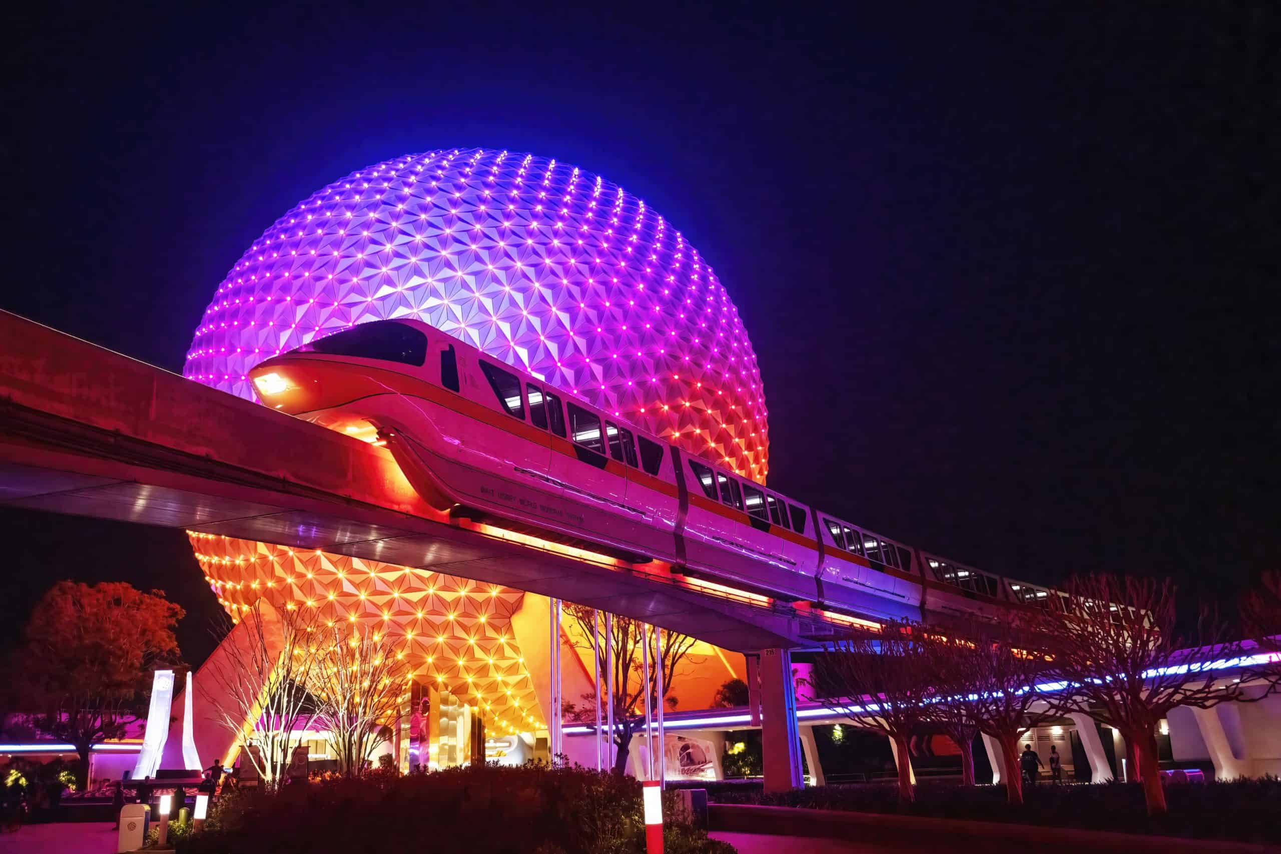 EPCOT Spaceship Earth and monorail at night